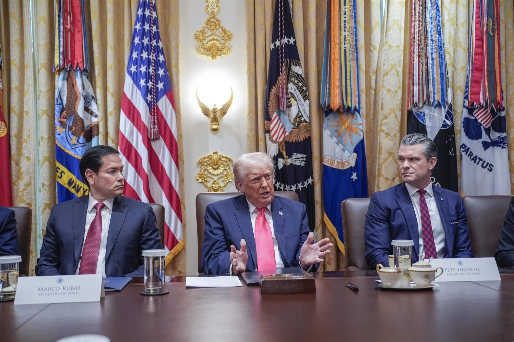 Donald Trump speaking at a cabinet meeting with Marco Rubio and Pete Hegseth.
