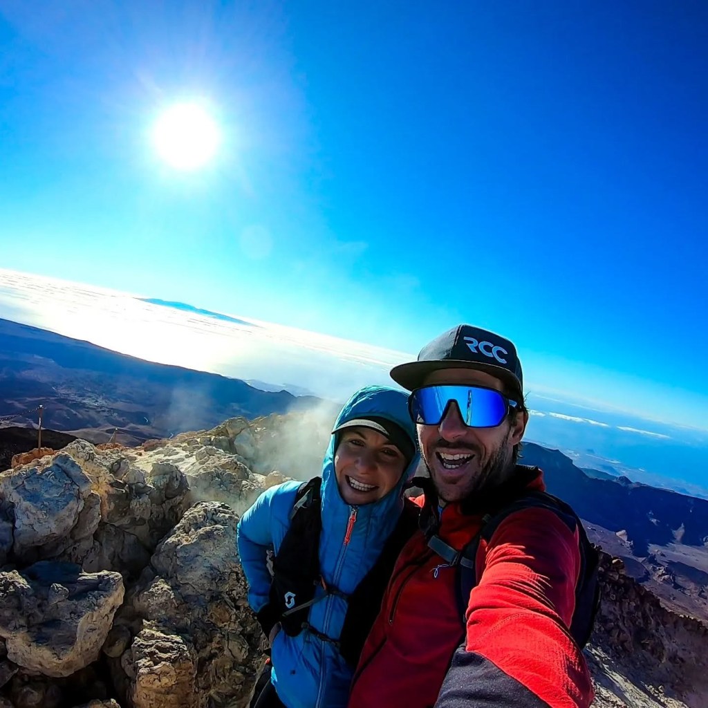 Kerstin Gurtner and Thomas Plamberger taking a selfie on a mountain peak.