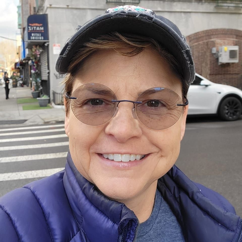 Wenne Alton Davis smiling at the camera.