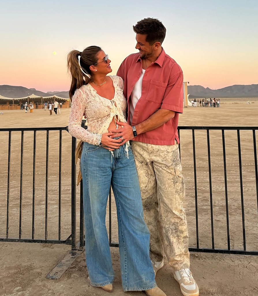 JoJo Fletcher and Jordan Rodgers cradling her baby bump in an outdoor desert setting.
