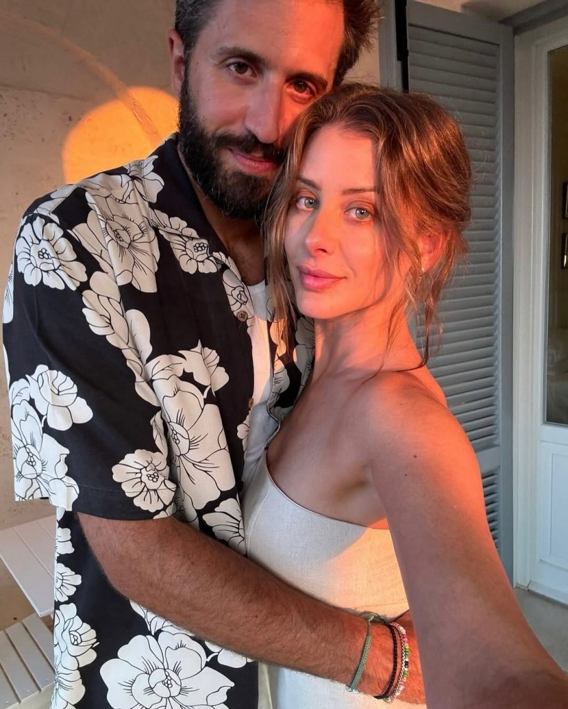 Lo Bosworth and her husband posing for a picture.