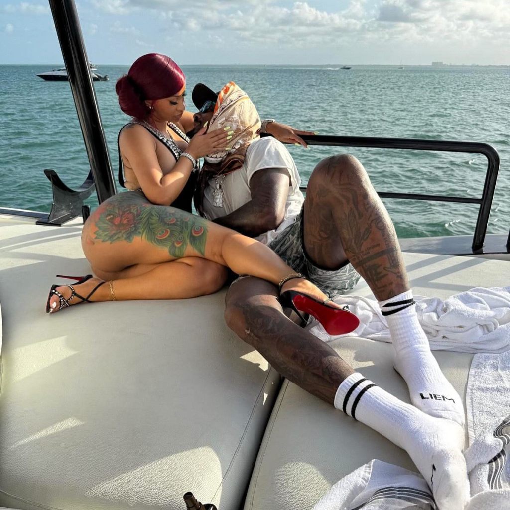 Cardi B and Stefon Diggs on a boat.