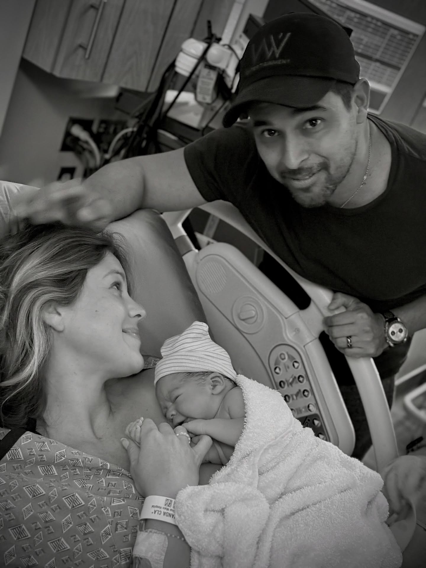 Wilmer Valderrama and Amanda Pacheco with their son