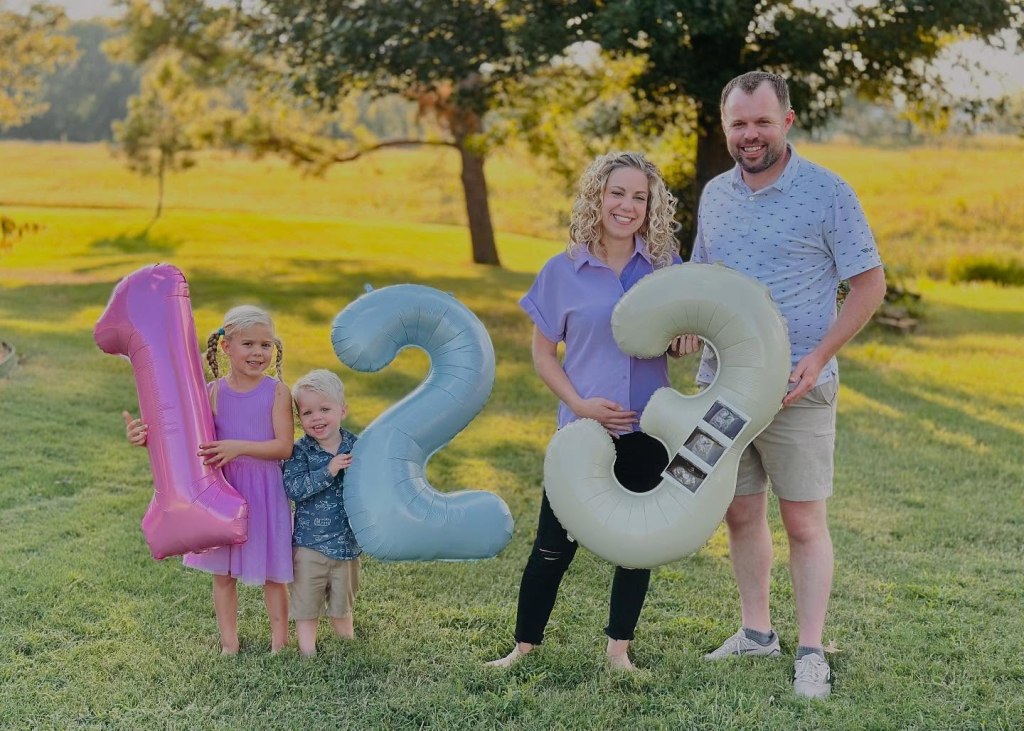 John and Abbie Duggar with their two children announcing their third pregnancy.