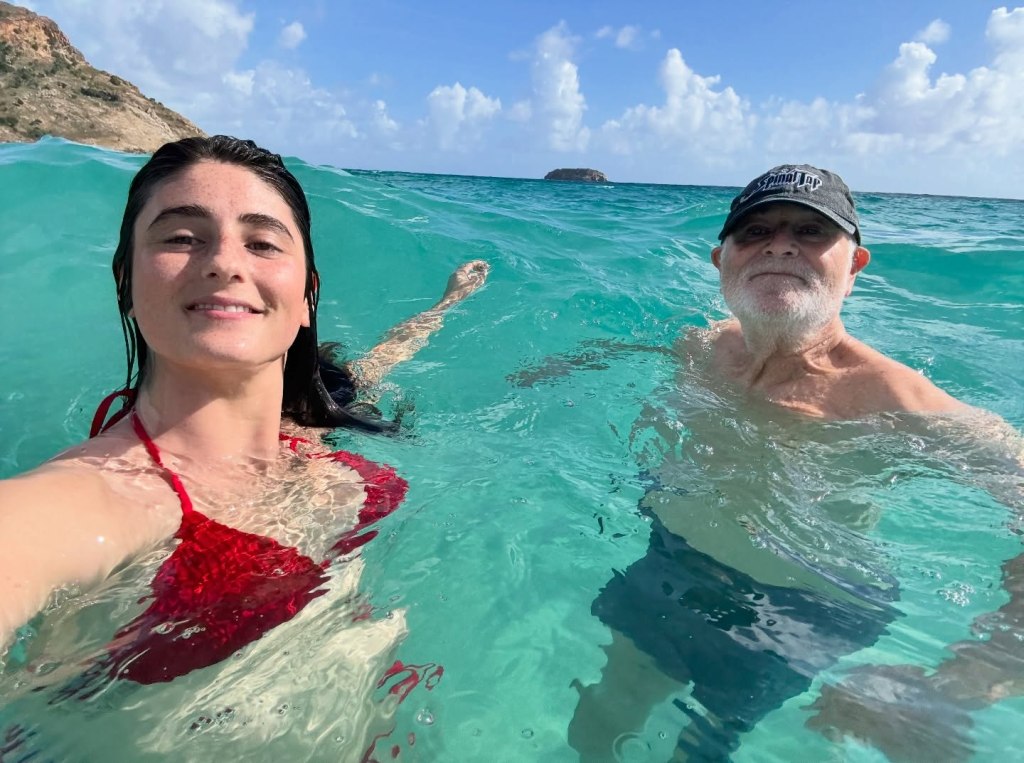 Romy and Rob Reiner swimming in the ocean.