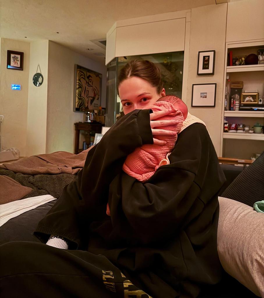 Pete Davidson holding Elsie.