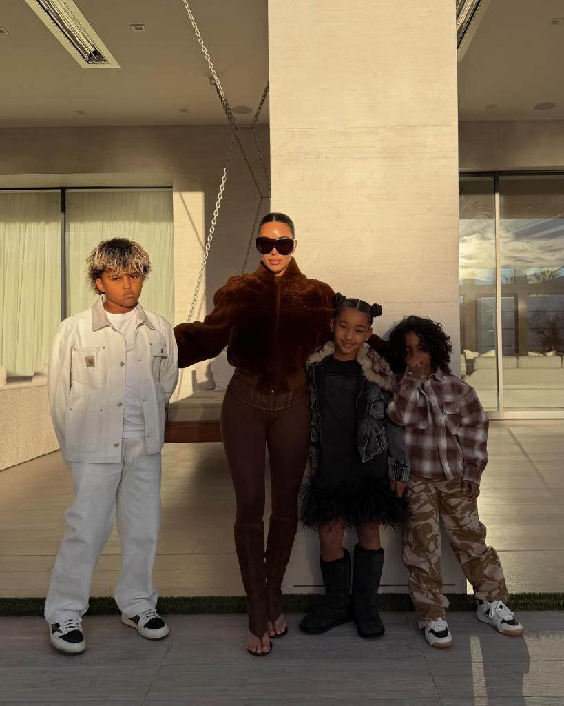 Kim Kardashian with her children North West, Saint West, and Chicago West.