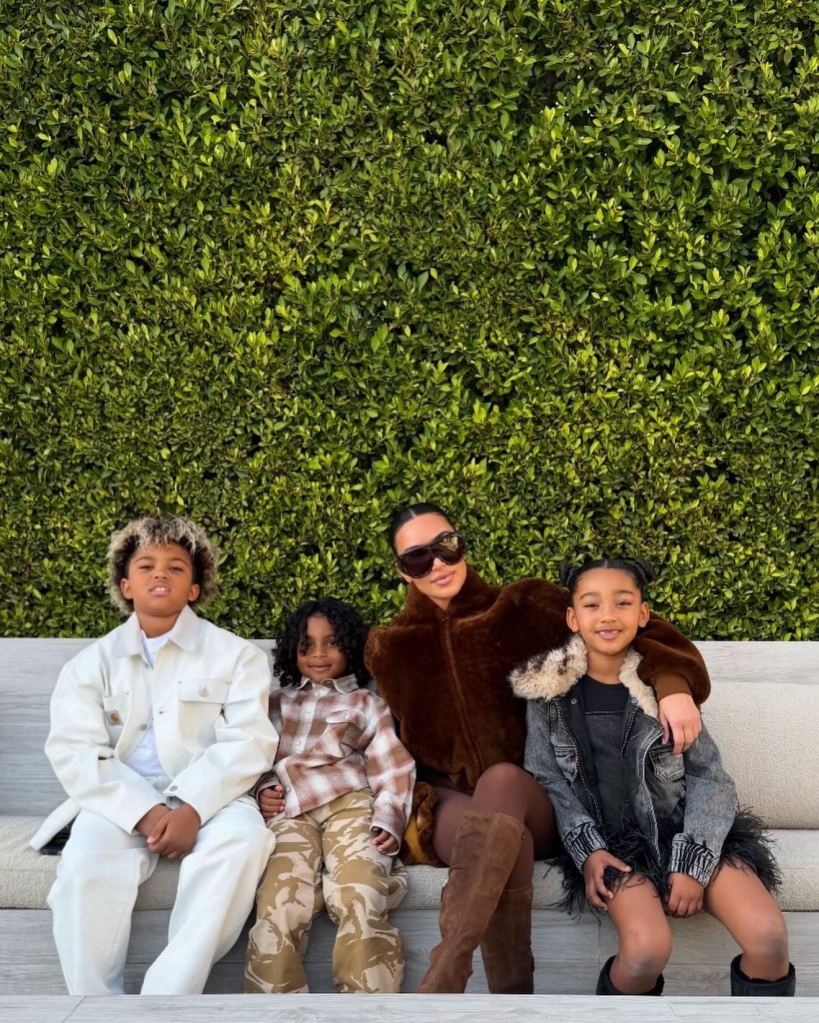 Kim Kardashian with three of her children: North West, Saint West, and Chicago West.