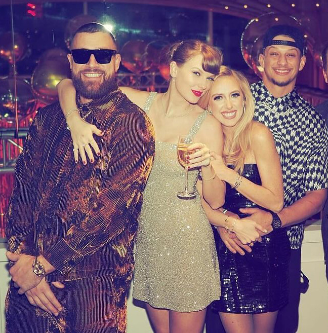 Travis Kelce, Taylor Swift, Brittany Mahomes, and Patrick Mahomes posing together at a party.
