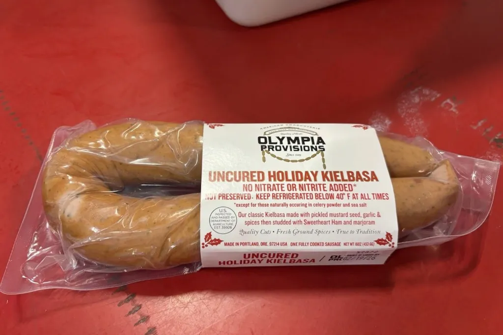 Olympia Provisions Uncured Holiday Kielbasa in vacuum-sealed packaging.