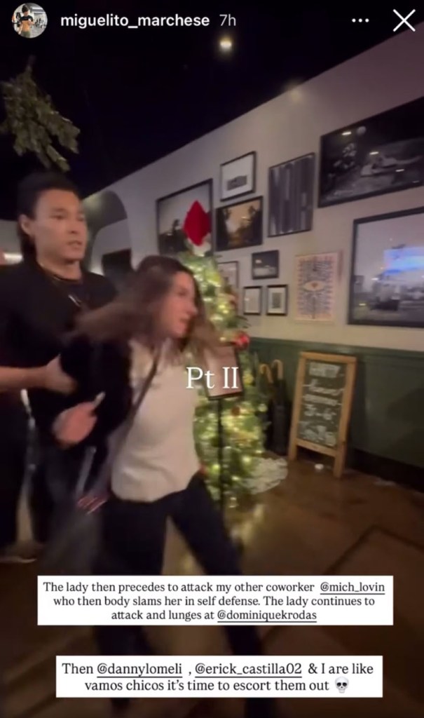 A man holding a woman's arm, attempting to restrain her, in a bar decorated for Christmas.