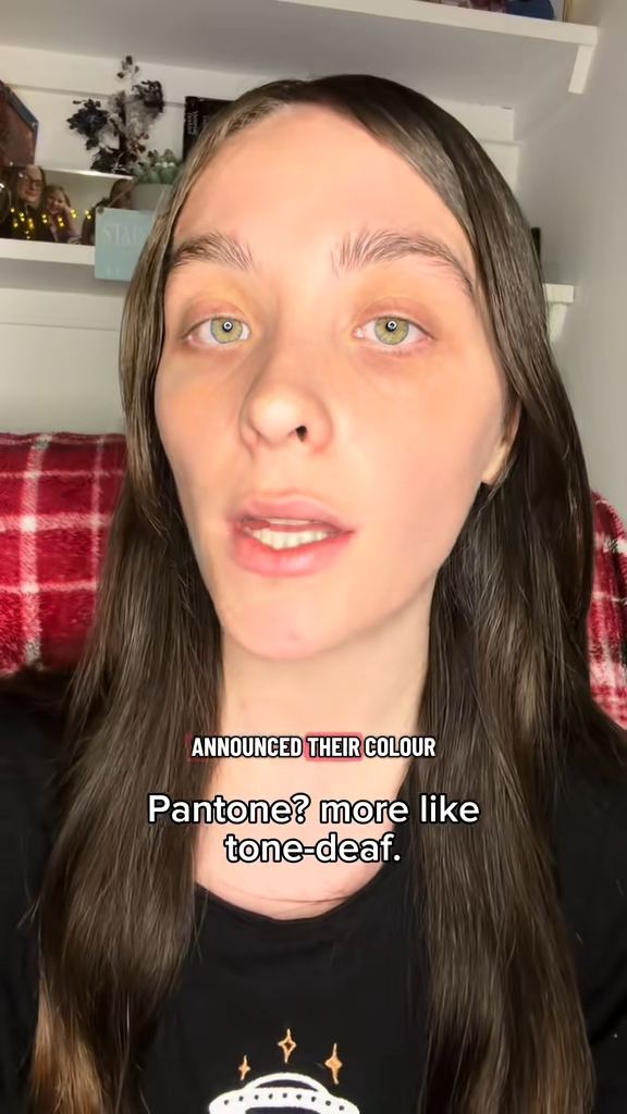 A woman in a close-up shot with text overlays, 