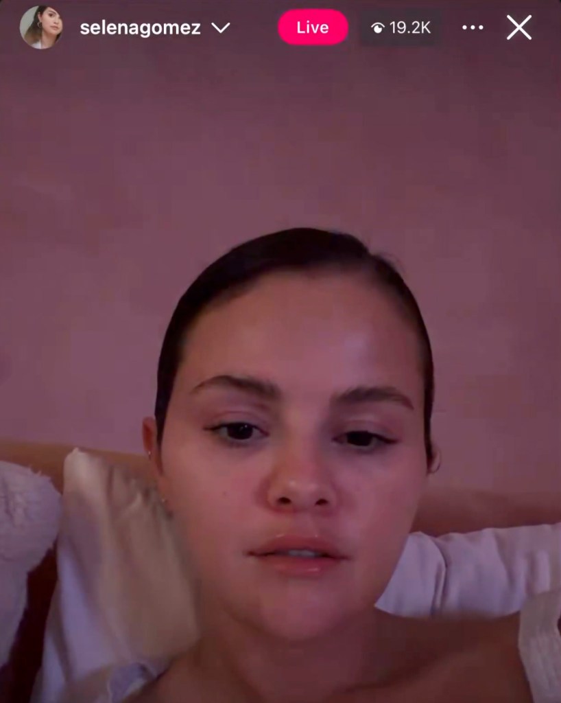 Selena Gomez on an Instagram Live video, looking serious.