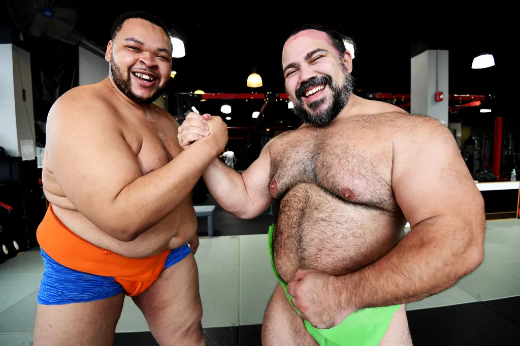 Ortiz and Miller shake hands.