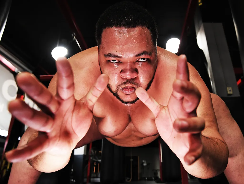 Miller looks into the camera.