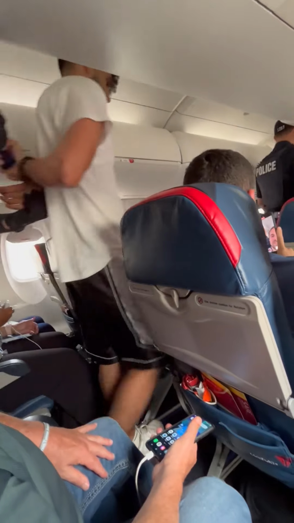 Nikprelaj appeared to nod off before chaos erupted again, when passengers hit emergency call buttons after seeing him mess with the emergency exit door.