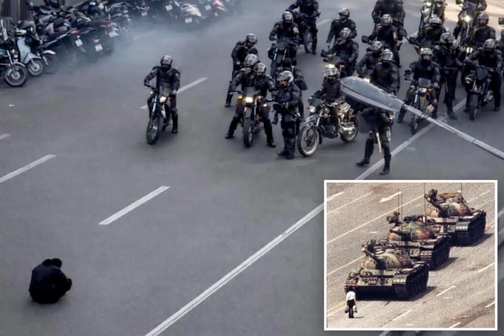 Powerfil image of lone Iranian protester in front of security forces draws parallels to Tiananmen Square ‘Tank Man’