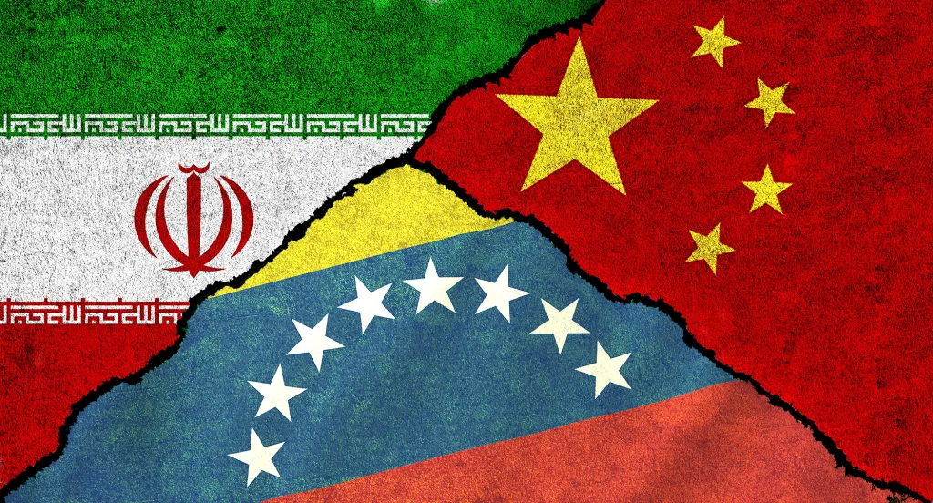 Illustration of the flags of Iran, Venezuela, and China, torn and interwoven, suggesting geopolitical alliance or conflict.