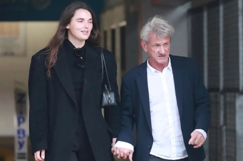Sean Penn, 65, and much-younger girlfriend, 30, hold hands on rare public outing after Golden Globes