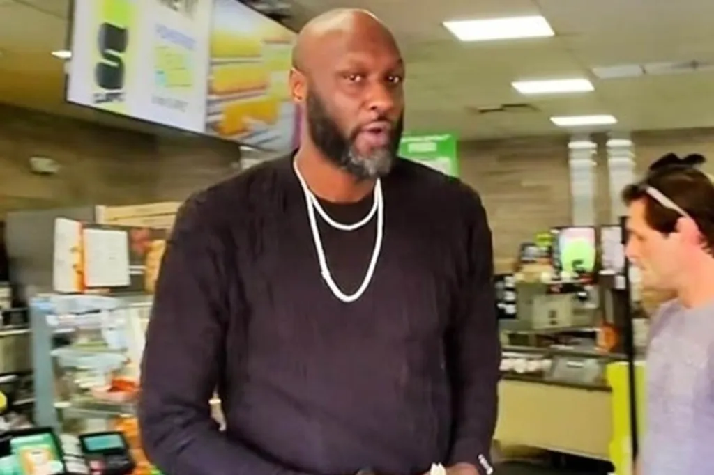 Lamar Odom talking in a store.