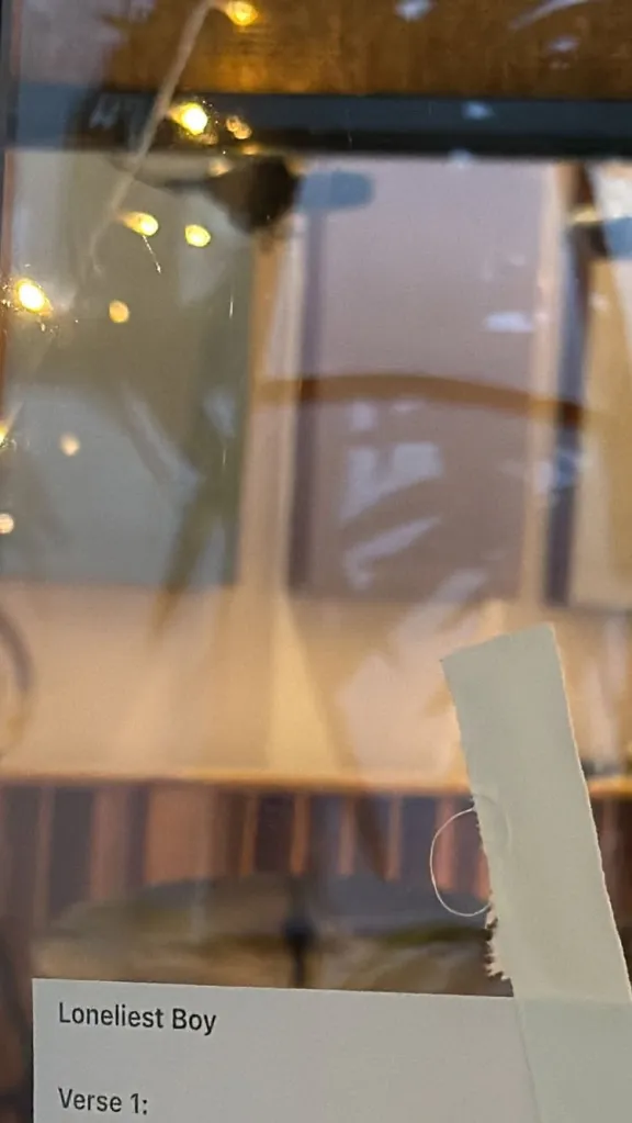 Printed lyrics that read 