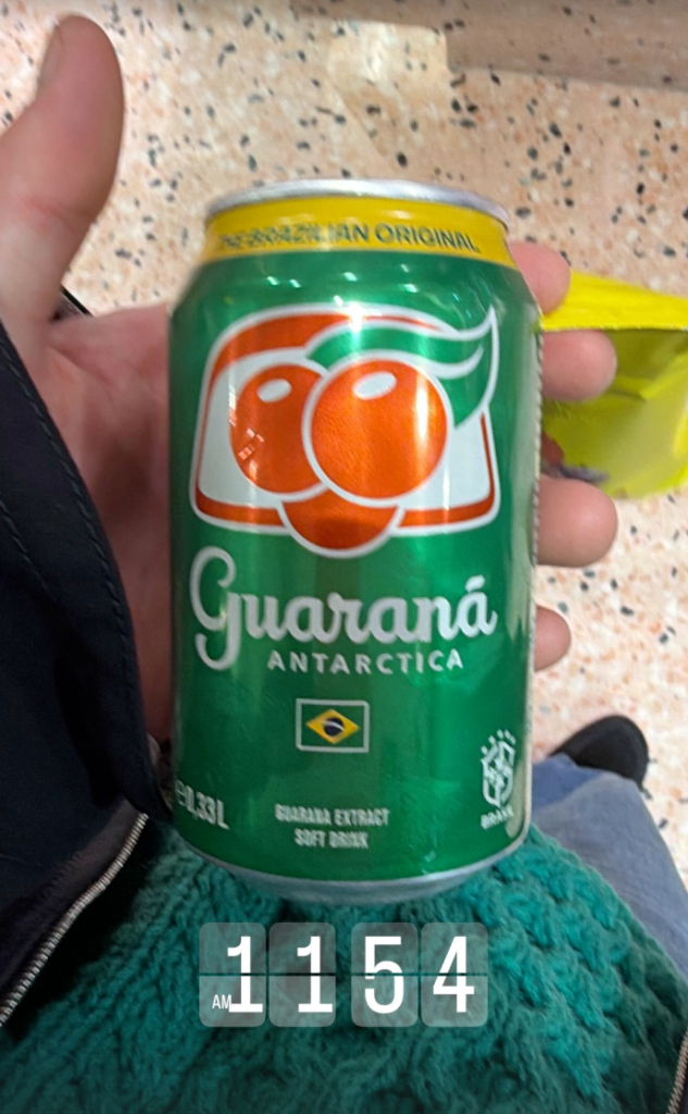 Cruz Beckham holding a soda can.