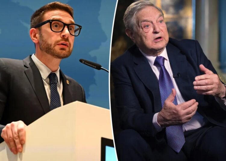Billionaire scion George Soros slums it in business class after Davos