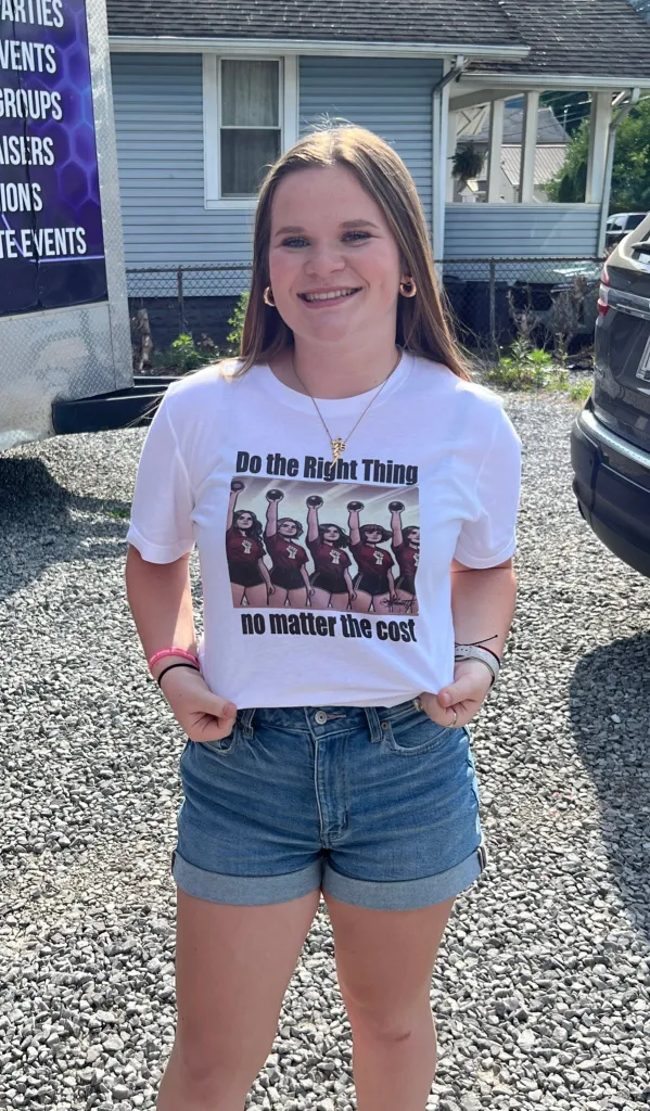 Emmy Salerno wearing a white t-shirt with 