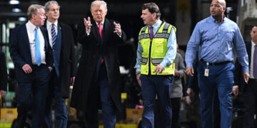 Trump Makes Obscene Gesture at Heckler in Ford Factory Tour