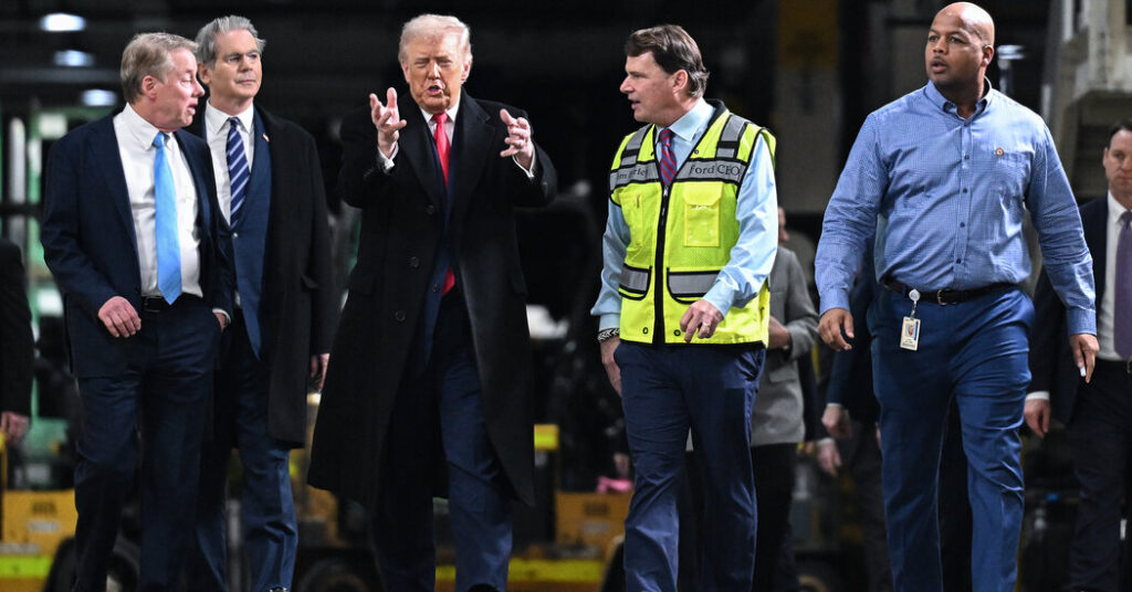 Trump Makes Obscene Gesture at Heckler in Ford Factory Tour
