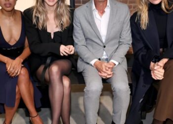 Behind glam luxury brands Michael Kors and Jimmy Choo lurks a troubled holding company losing millions