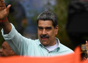 First Photos of Defiant Maduro in Custody Emerge