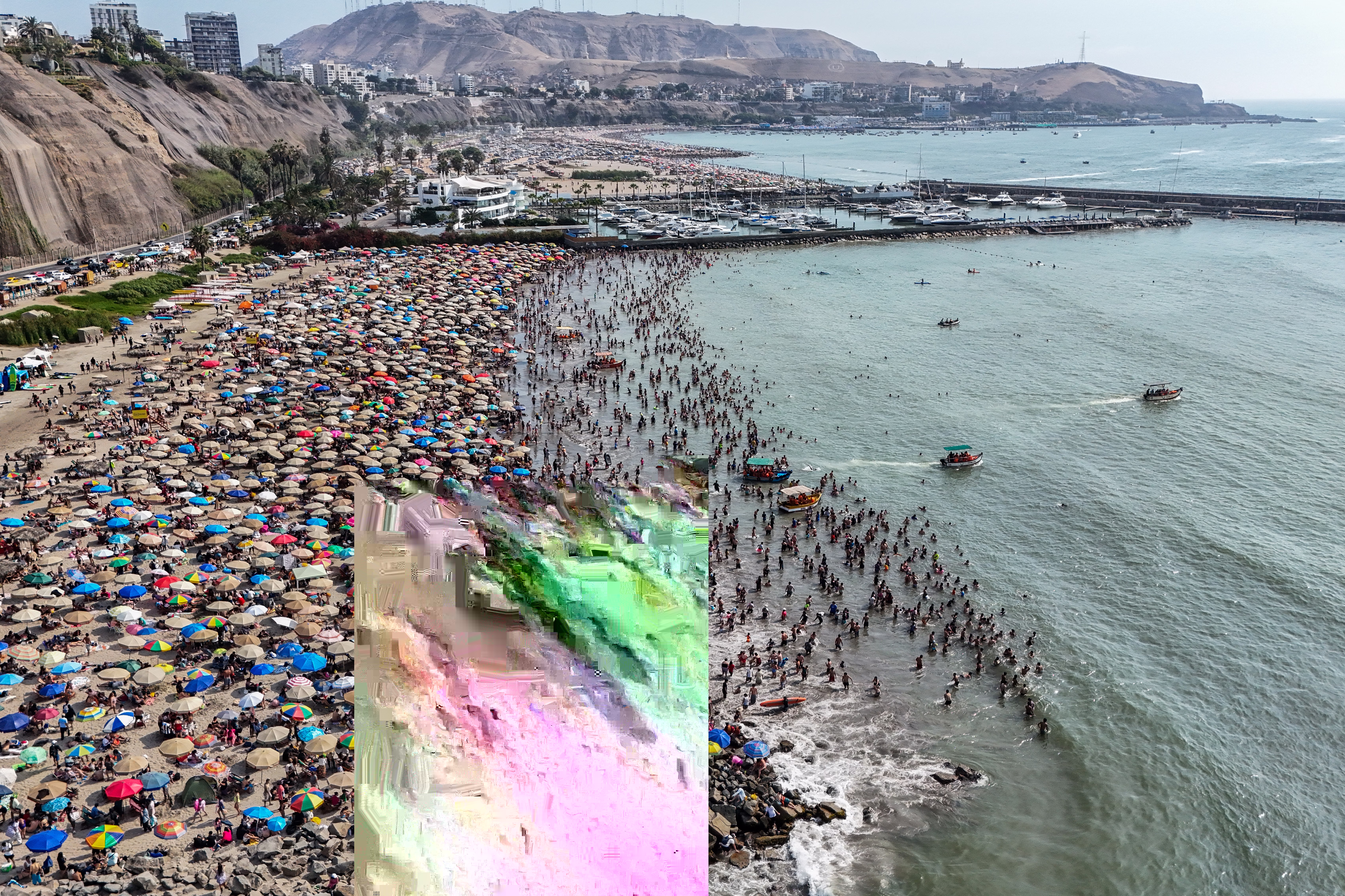 An aerial view of a very crowded beach, covered with many umbrellas