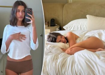 Cheeky Hailey Bieber wears nothing but bed sheets in racy new photo shoot