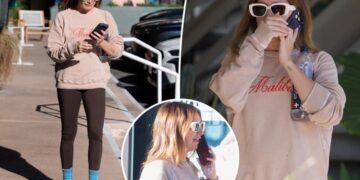See photos of Ashley Tisdale’s  somber phone conversation as ‘toxic’ mom group drama continues