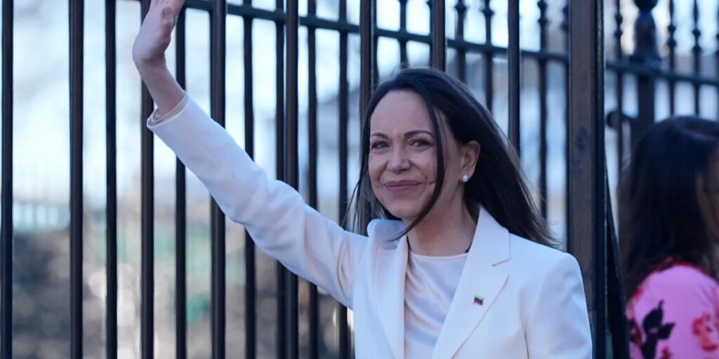 Venezuela’s opposition leader doesn’t respond to reporter questions about whether she gave her Nobel to Trump