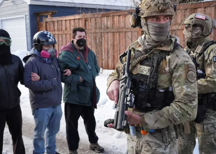 ‘Hallmarks of an occupation’: Chaos as masked ICE agents terrorize neighborhoods