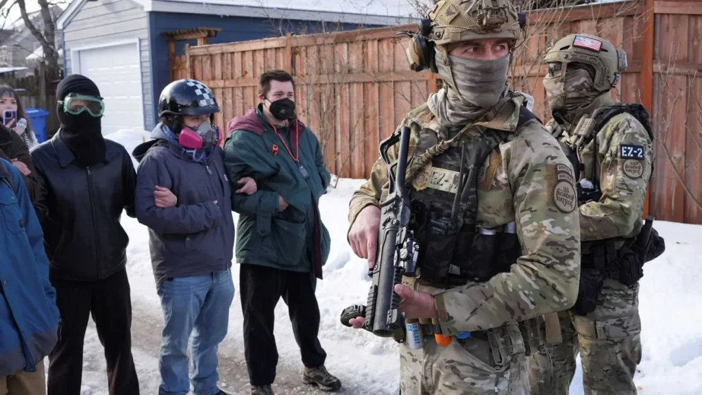 ‘Hallmarks of an occupation’: Chaos as masked ICE agents terrorize neighborhoods