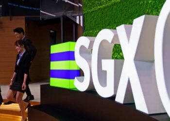 Singapore tries to give its flagging stock market a kickstart with a link to the NASDAQ, allowing firms to easily list in both places