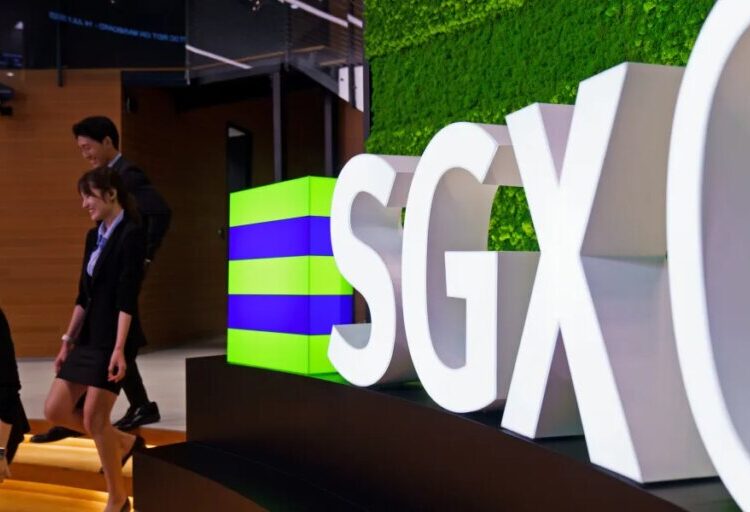 Singapore tries to give its flagging stock market a kickstart with a link to the NASDAQ, allowing firms to easily list in both places