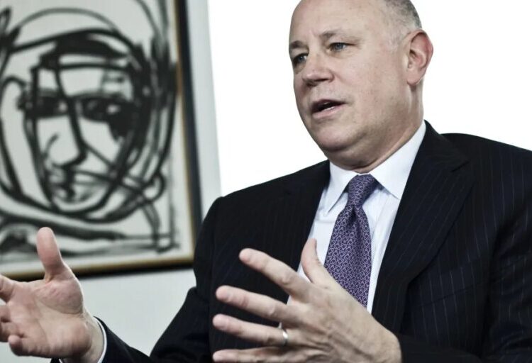 Meet the self-made billionaire who bought a nearly bankrupt company off Warren Buffett for $1,000 and turned it into a $98 billion giant