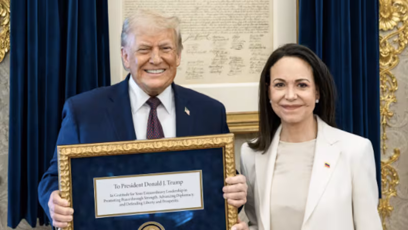 Venezuelan opposition leader Maria Corina Machado presents Donald Trump with her Nobel Peace Prize.