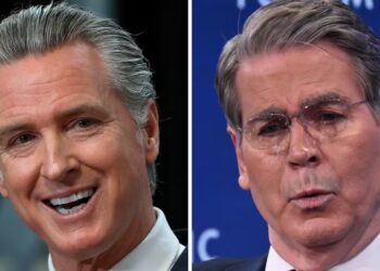 Newsom Takes Front Seat to Troll Trump Goon on Stage