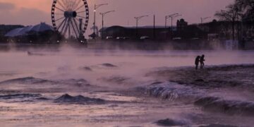 ‘I’ve been here a while and my brain stopped working’: Americans struggle with sub-freezing wind chill as storm closes in
