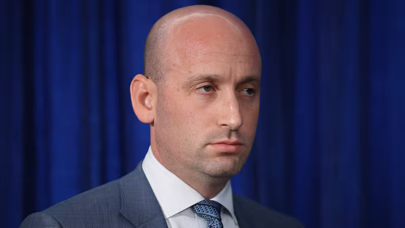 White House Deputy Chief of Staff and Homeland Security Advisor Stephen Miller listens as U.S. President Donald Trump addresses the media during a news conference at his Mar-a-Lago club on January 03, 2026, in Palm Beach, Florida.