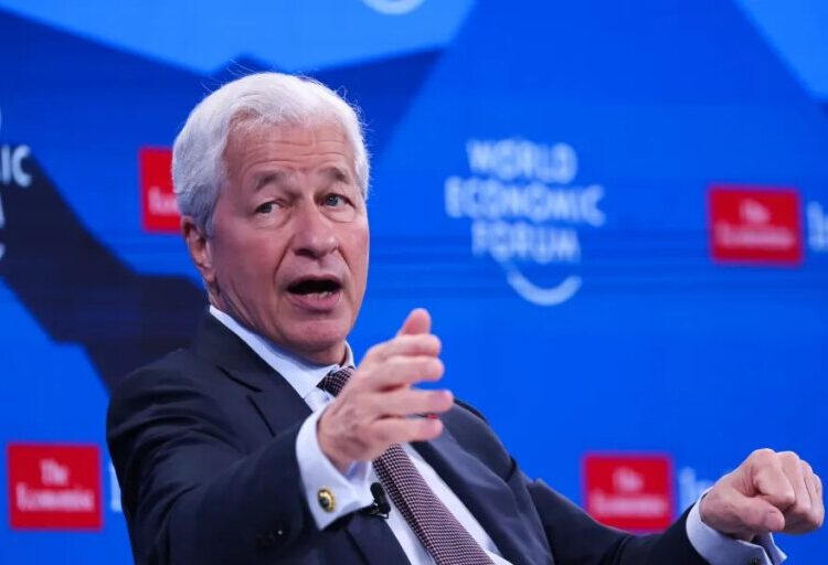 How leaders like Jamie Dimon and Microsoft president Brad Smith are trying to ease employee anxiety about AI
