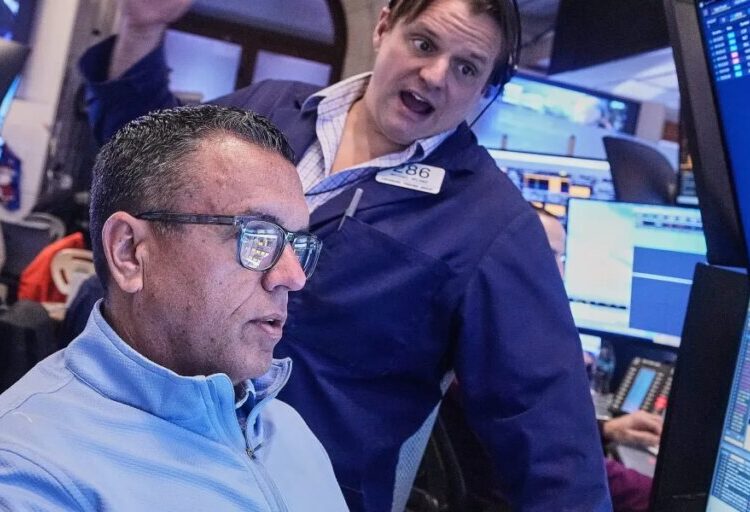 Wall Street flirts with record high as GM, UnitedHealth report earnings