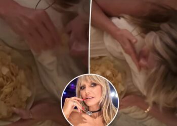 Heidi Klum gets cheeky butt massage while shamelessly chowing down on chips