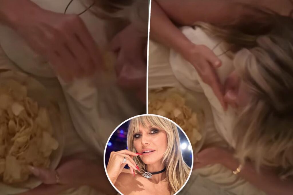 Heidi Klum gets cheeky butt massage while shamelessly chowing down on chips