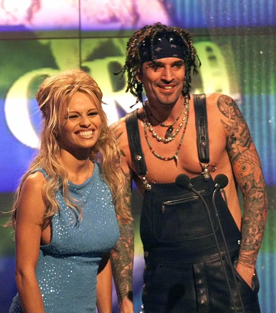 Pamela Anderson presents a music category with her husband Tommy Lee during the awards ceremony in Monaco, French Riviera, in May 5, 1999